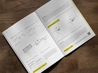 Aufgeklapptes Fitting Box Handbuch