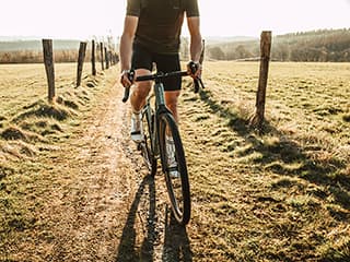 Road cyclist on tour