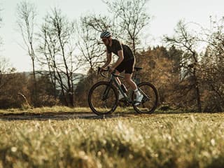 Road cyclist on tour