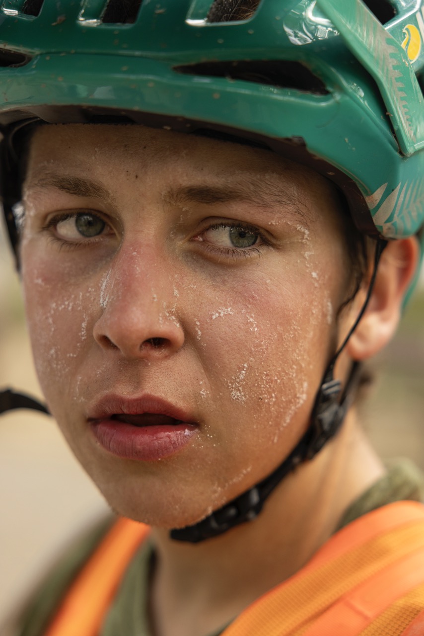 An intense portrait of Matthew Fairbrother, his face marked by salt traces — evidence of the effort behind his ride with Ergon saddle and grips.