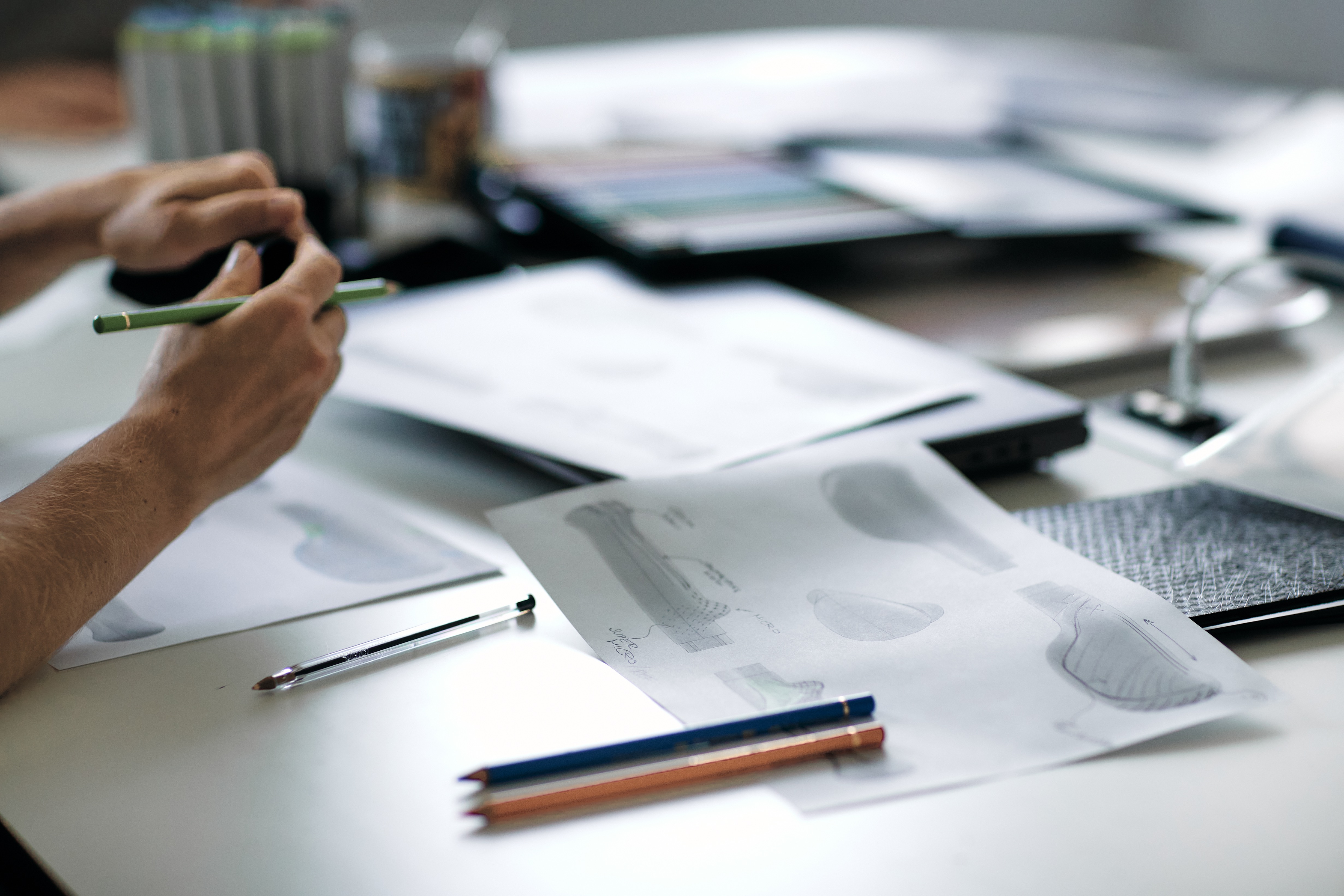 Model drawings of Ergon bike grips on the table.