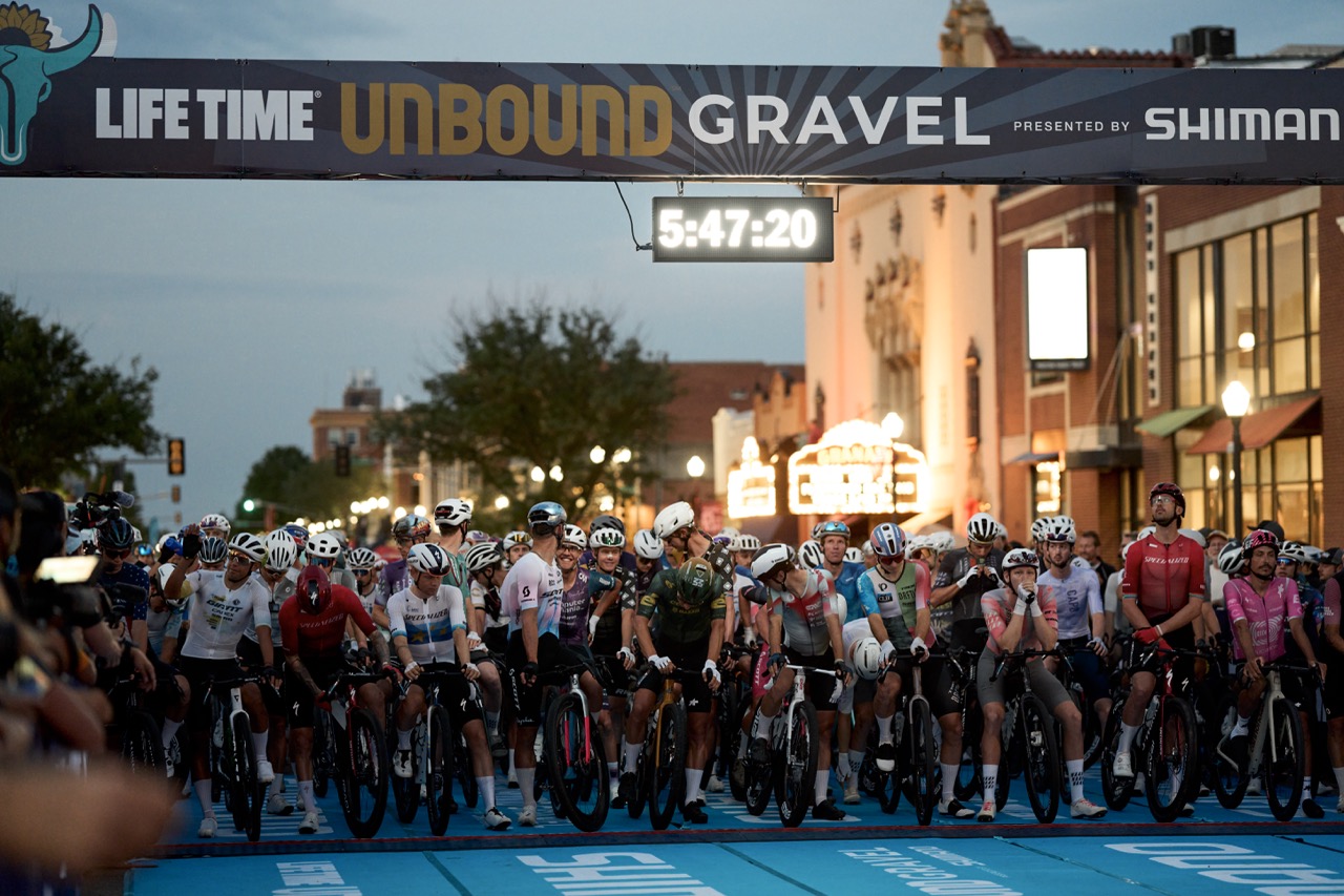Participants in the Unbound race are waiting at the starting line for the race to begin.