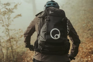 BX4 from behind Man wears BX4 backpack