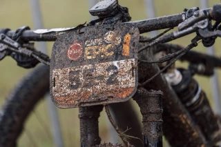 Cape Epic 2025 Bike Dirty Cape Epic Sign on handlebar
