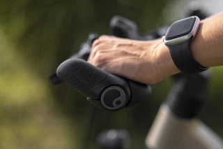 Ergon GP2 bicycle grip Hand encloses Ergon GP2 bicycle grip.