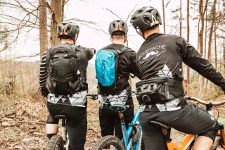 MTB group forest 3 MTB riders in a forest